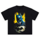 Batman Broken Cowl T-Shirt with scarred mask and glowing Bat symbol in Gotham shadows