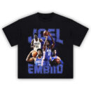 Joel Embiid Process Poster Tee featuring dynamic collage of iconic Sixers moments in blue and white tones