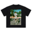 Mike Tyson tiger walk tee featuring vintage photo of Tyson walking white tiger in Tommy Hilfiger with pastel handwritten logo