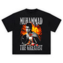 Muhammad Ali The Greatest tee with flame background, KO scene, and chrome-effect title lettering honoring boxing’s GOAT