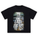 The Last of Us Tee featuring Joel and Ellie walking a broken road with infected cordyceps text effect