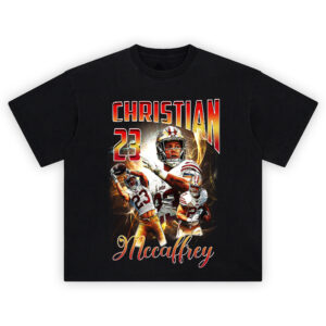 Christian McCaffrey CMC 23 Graphic Tee featuring collage of CMC in action with bold fire background and 23 highlights
