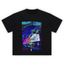 Travis Scott Astroworld T-Shirt with Travis sitting in front of monster and carnival sign, neon colors, lightning-filled sky.