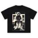 J Cole Off-Season T-Shirt featuring Cole sitting on a basketball hoop with clouds and monochrome aesthetic, “Off-Season” text on chest.