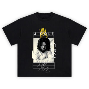 J Cole 1985 T-Shirt featuring grayscale portrait of Cole, handwritten 1985 text, signature, and yellow crown over clean line design.
