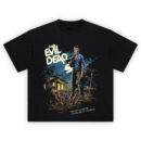The Evil Dead Retro Horror T-Shirt with Ash Williams standing in front of a haunted cabin and deadites rising