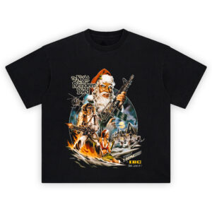 The Night the Reindeer Died T Shirt featuring armed Santa, explosions, and a holiday battle scene inspired by Scrooged