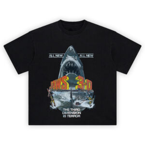 Jaws 3-D Vintage Movie Poster Graphic Tee with great white shark, water-skiers, and bold retro film typography