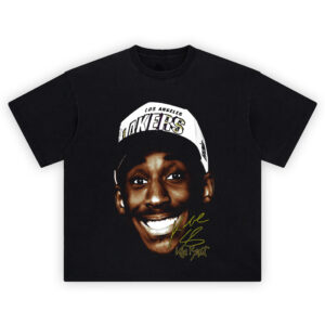 Kobe Bryant Shirt with smiling rookie portrait, Lakers cap, and gold script signature on black