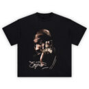Kobe Bryant Rings Shirt with profile pose, stacked gold rings, and cursive autograph on black