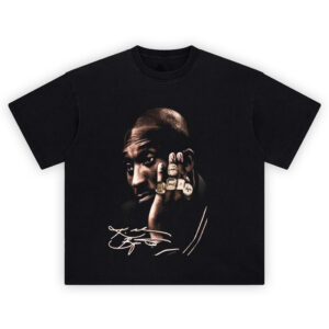 Kobe Bryant Rings Shirt with profile pose, stacked gold rings, and cursive autograph on black
