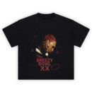 Breezy Bowl XX Tee graphic showing a red hair profile portrait with jewelry details, red star symbols, “BREEZY BOWL XX” text, and red stamp-style marks on a black tee.