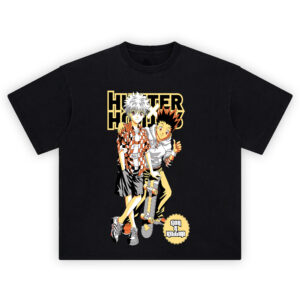 Hunter x Hunter Duo Tee graphic showing two anime characters in front of a bold “HUNTER x HUNTER” logo, with a skateboard detail and a round stamp-style badge on a black tee.