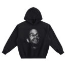 Malcolm X Big Face Hoodie with black-and-white portrait of Malcolm X wearing glasses and looking upward on black
