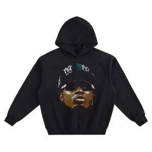 Gervonta Davis Big Face Hoodie graphic showing an upward-angled close-up portrait wearing dark shades and a cap with “NY” logos, plus a red signature mark on a black hoodie.