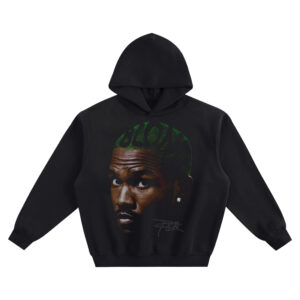 Frank Ocean Big Face Hoodie graphic showing a close-up three-quarter portrait with green hair reading “BLOOD,” a stud earring, and a signature detail on a black hoodie.