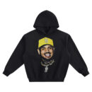 Chris Brown Yellow Cap Big Face Hoodie graphic showing a centered portrait of Chris Brown in a yellow cap with a wide grin, stud earrings, and layered gold chains with a large pendant on a black hoodie.