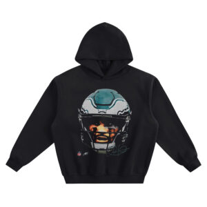 Jalen Hurts Big Face Hoodie graphic showing a close-up portrait of Jalen Hurts in an Eagles helmet with a dark visor and signature detail on a black hoodie.