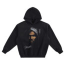 Kevin Durant Big Face Hoodie graphic showing a hooded close-up portrait of Kevin Durant in deep shadow with a “KDB” signature mark on a black hoodie.