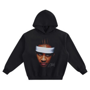 Front: Carmelo Anthony Big Face Hoodie graphic showing a close-up portrait of Carmelo Anthony wearing a white headband with short braids and a signature-style mark on a black hoodie.