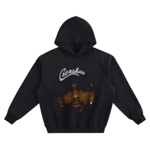Nipsey Hussle Crenshaw Hat Hoodie graphic showing a close-up portrait wearing a dark “Crenshaw” script hat with stud earring highlights on a black hoodie.
