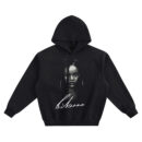 Rihanna Signature Big Face Hoodie graphic showing a monochrome close-up portrait with hoop earrings, a face-framing hair strand, and a large Rihanna signature on a black hoodie.