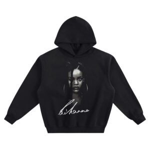 Rihanna Signature Big Face Hoodie graphic showing a monochrome close-up portrait with hoop earrings, a face-framing hair strand, and a large Rihanna signature on a black hoodie.