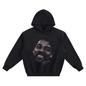 Dr. J Big Face Hoodie graphic showing a close-up smiling portrait of Julius Erving with a white signature-style mark beneath the face on a black hoodie.