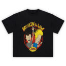 Beavis and Butt-Head Big Face Tee graphic showing “BREAKIN’ the LAW” text above Beavis and Butt-Head inside a red flame circle with the MTV Beavis and Butt-Head burst label on a black tee.