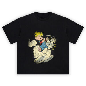 Dennis the Menace Graphic Tee graphic showing a blond kid in blue overalls and a red-and-black striped shirt riding a fluffy white dog in a cartoon tugging scene on a black tee.