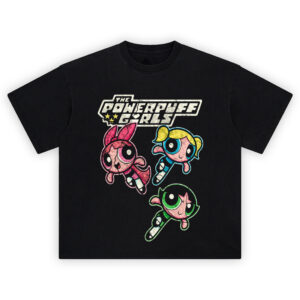 The Powerpuff Girls Graphic Tee graphic showing the “THE POWERPUFF GIRLS” logo above Blossom, Bubbles, and Buttercup flying in a diagonal trio formation on a black t-shirt.