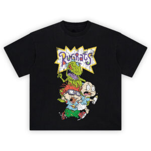 Rugrats Graphic Tee graphic showing a purple “Rugrats” logo in a white starburst with yellow outline above Reptar with open mouth, plus Tommy holding a bottle and Chuckie with purple glasses on a black tee.