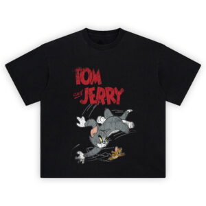 Tom and Jerry Graphic Tee featuring distressed red “TOM and JERRY” text above Tom chasing Jerry in a classic cartoon action scene.