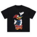 Woody Woodpecker Graphic Tee graphic showing Woody Woodpecker running with a red crest, long yellow beak, blue body, white gloves and shoes above the “Woody Woodpecker” logo text.